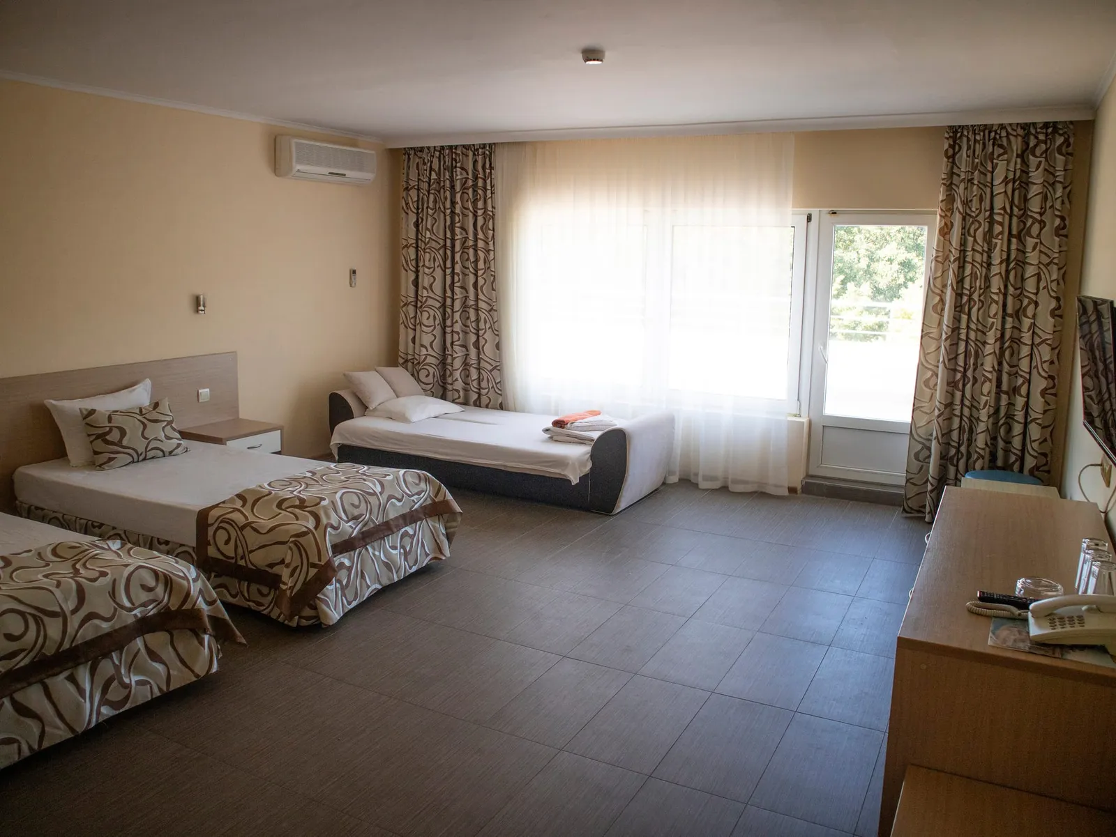 Family Room: beds and a desk in the spacious room